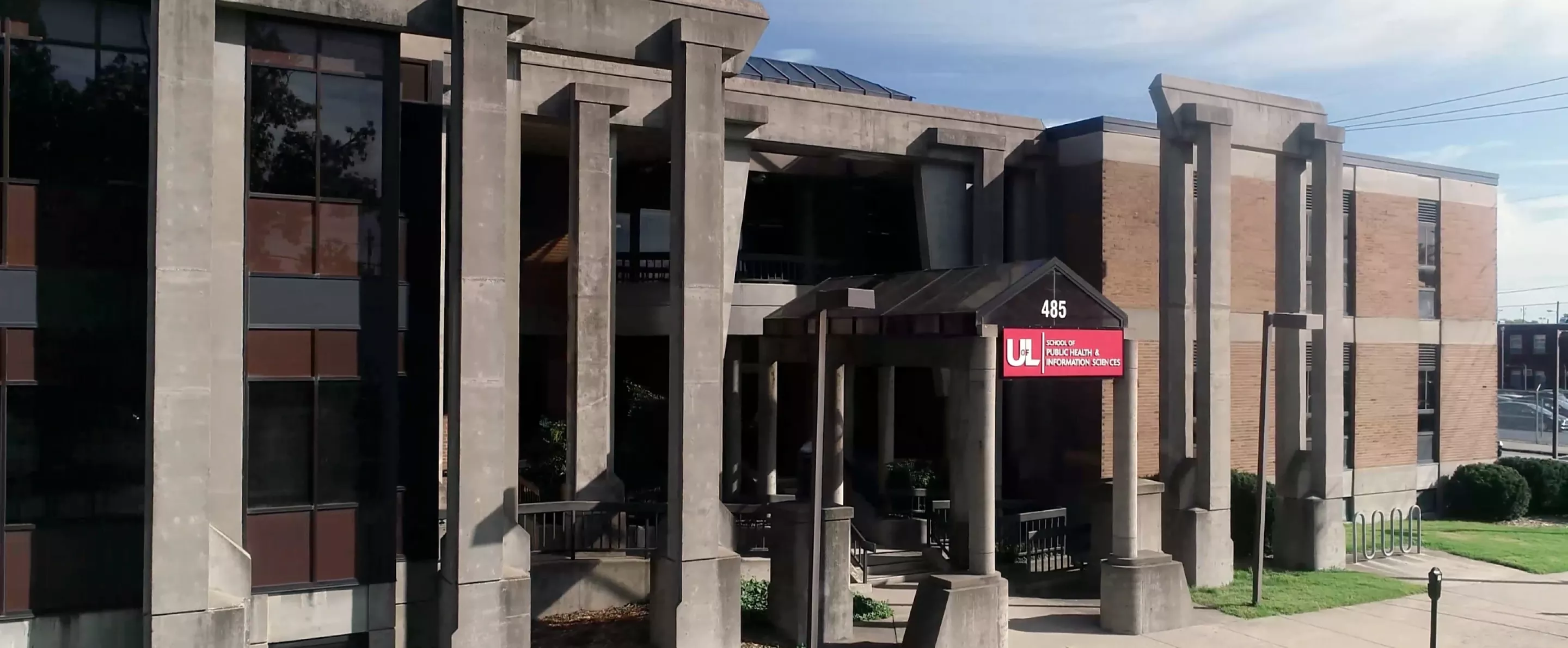 Still image from a drone video of the exterior of the School of Public Health & Information Sciences