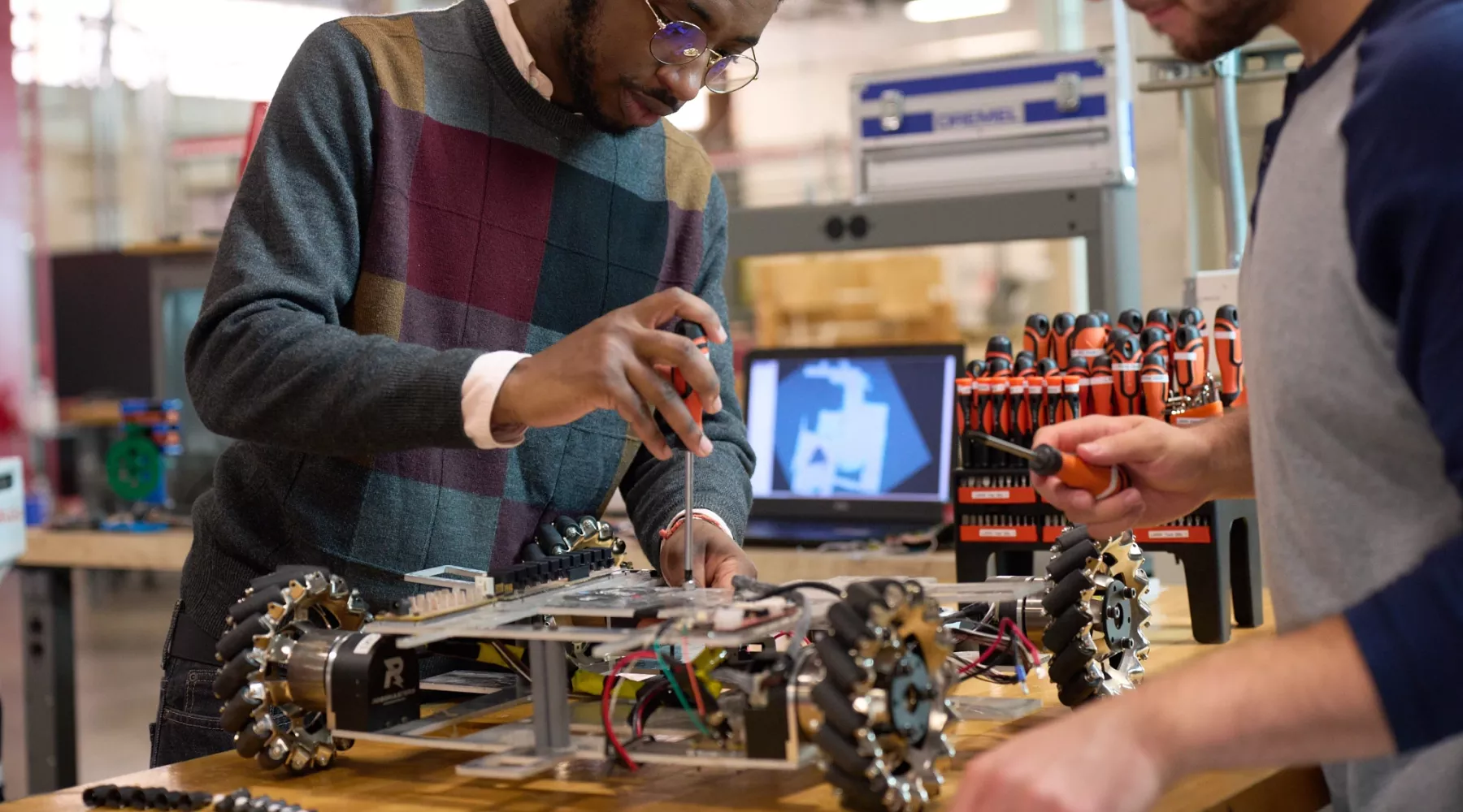 Students working on engineering project.