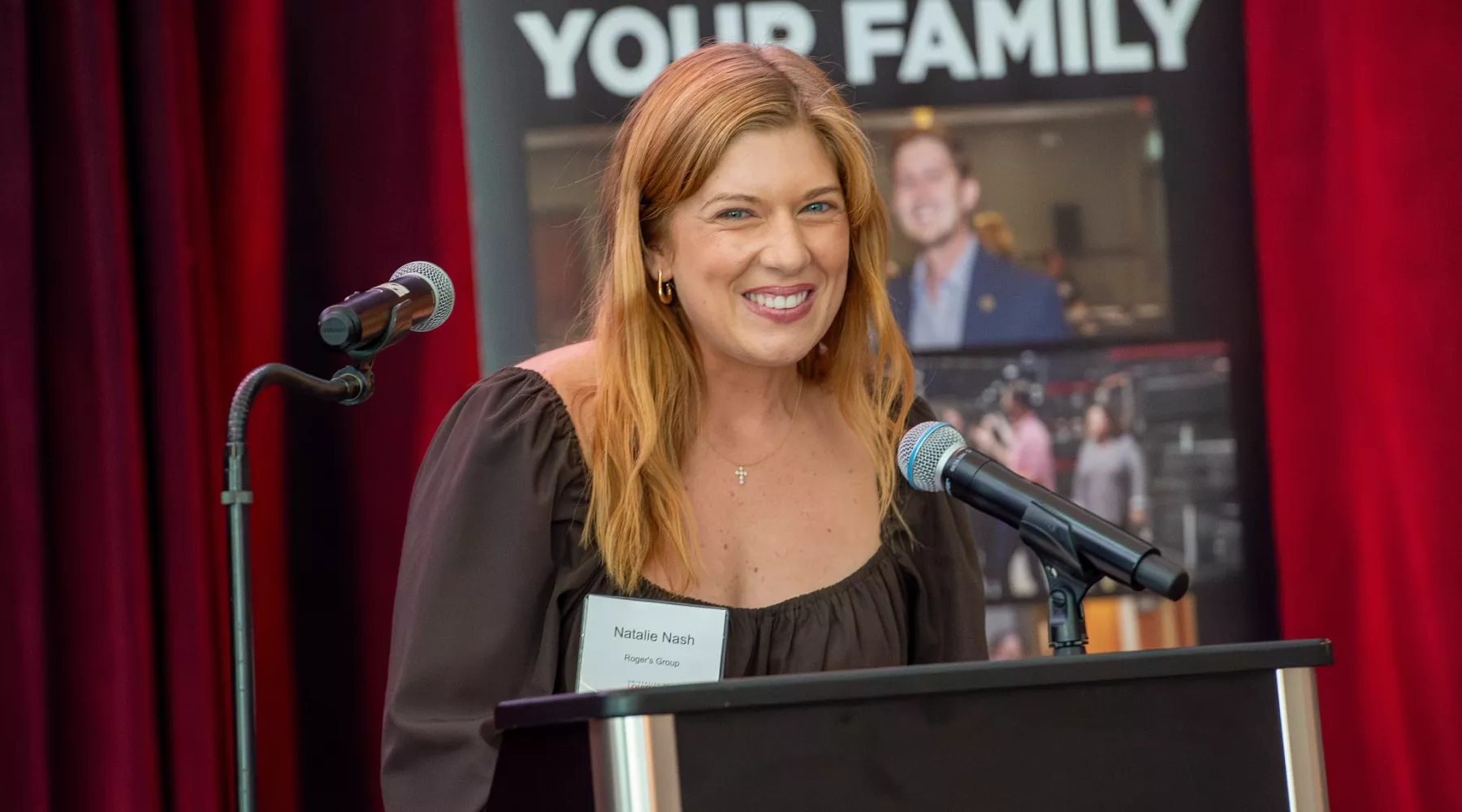 Natalie Nash of Rogers Group speaking at podium