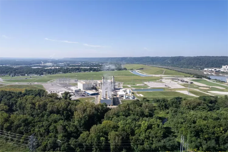 Aerial view of a factory releasing chemicals into the air