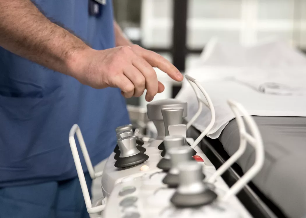 Up close image of doctor using radiology equipment