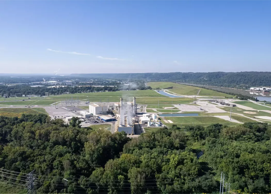 Aerial view of a factory releasing chemicals into the air