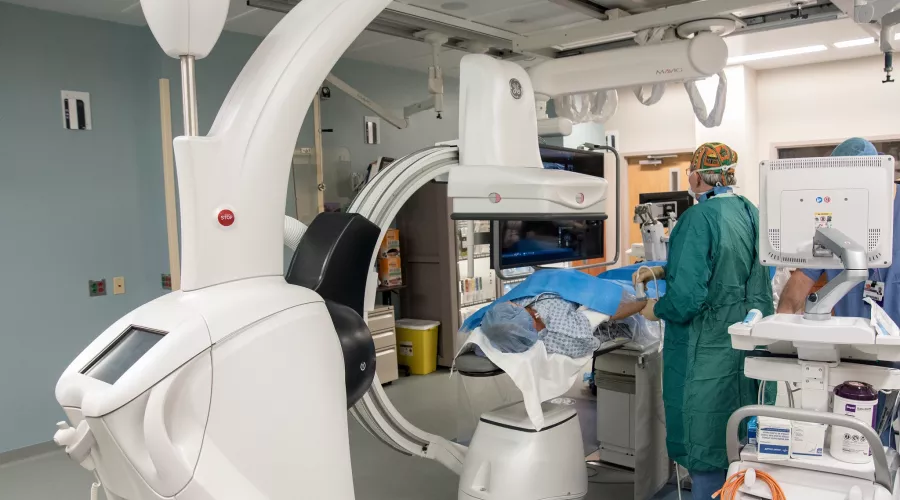 Doctor performs radiology tests on a patient