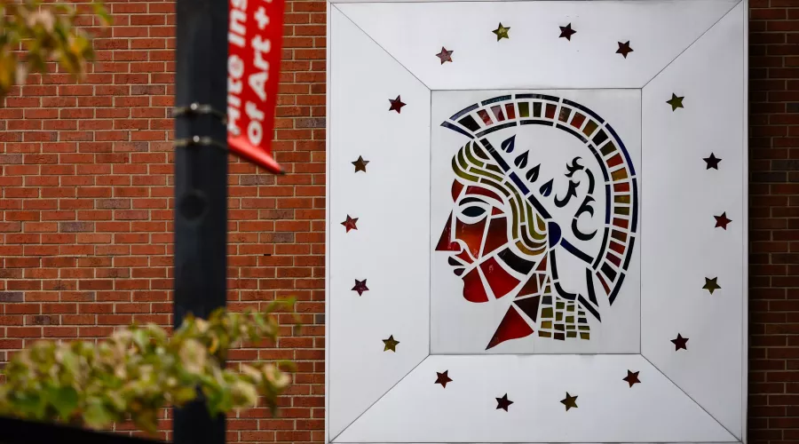 Close-up of the Minerva on the exterior of Schneider Hall