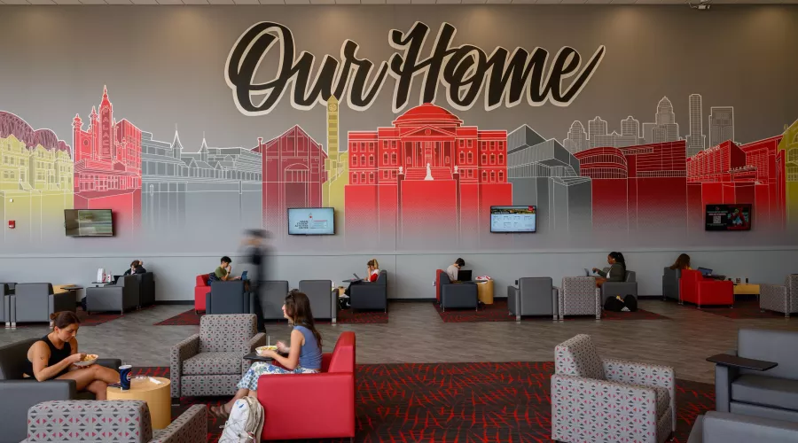 Interior Student Activity Center with Our Home Mural.